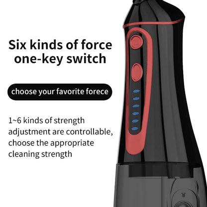 A close-up of a handheld beauty device in black and red, 'Six kinds of force one-key switch, choose your favorite forece,  strength adjustment.