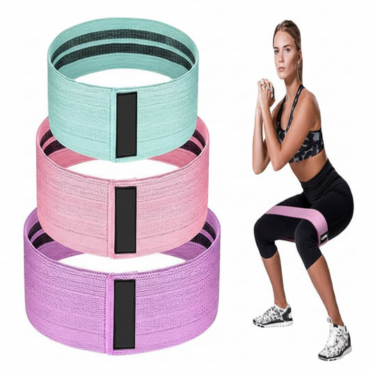Three resistance bands in green, pink, and purple with a woman in workout attire on a white background.