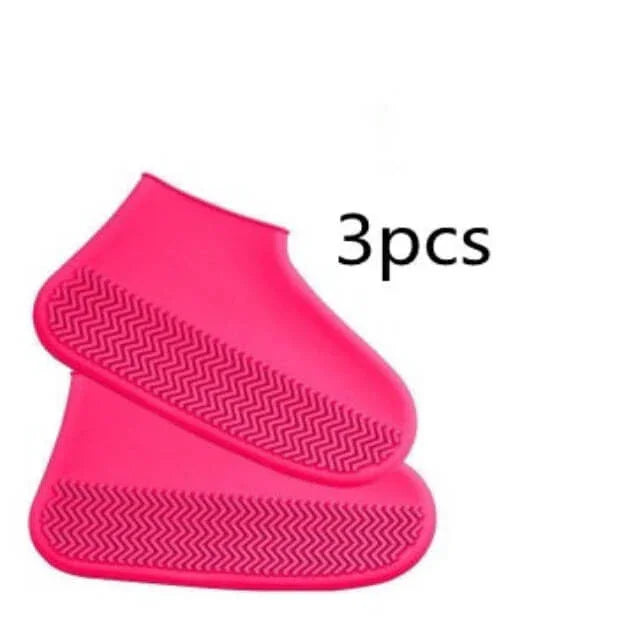 Two pink shoe covers with a textured sole on a white background, labeled '3pcs'.