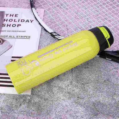Yellow fitness water bottle and badminton racket on gym floor, hydration gear for workouts