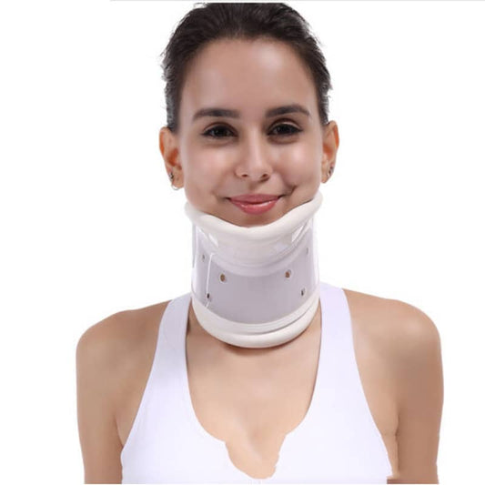 Woman wearing a white cervical collar on a white background
