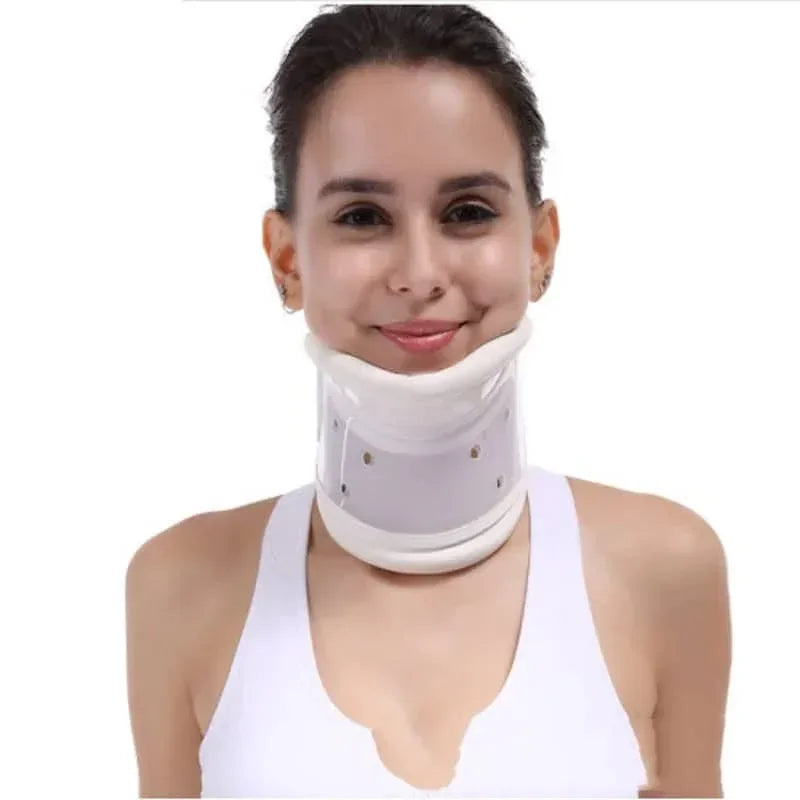 Woman wearing a white cervical collar on a white background