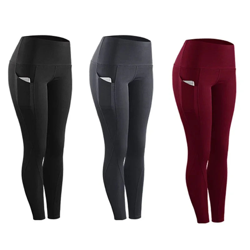 Three pairs of women's high-waisted fitness leggings in black, gray, and burgundy with side pockets holding smartphones