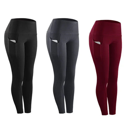 Three pairs of women's high-waisted fitness leggings in black, gray, and burgundy with side pockets holding smartphones