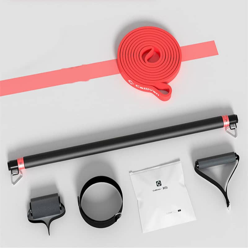 Calvin Klein fitness equipment set including resistance band, bar, and weights on a white background