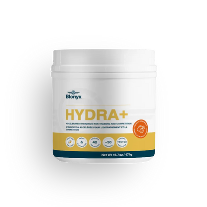 A white plastic tub of Blonyx HYDRA+ sports drink rehydration powder, featuring a white label with yellow, orange, and dark blue accents, set against a plain white background.