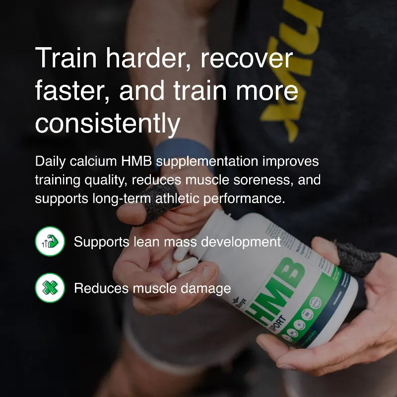 Person holding a supplement bottle with text about calcium HMB supplementation benefits.