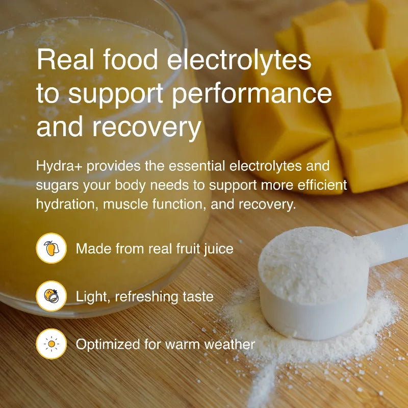 Hydration product with fruit juice and powder on a wooden surface, featuring text about electrolytes and performance.