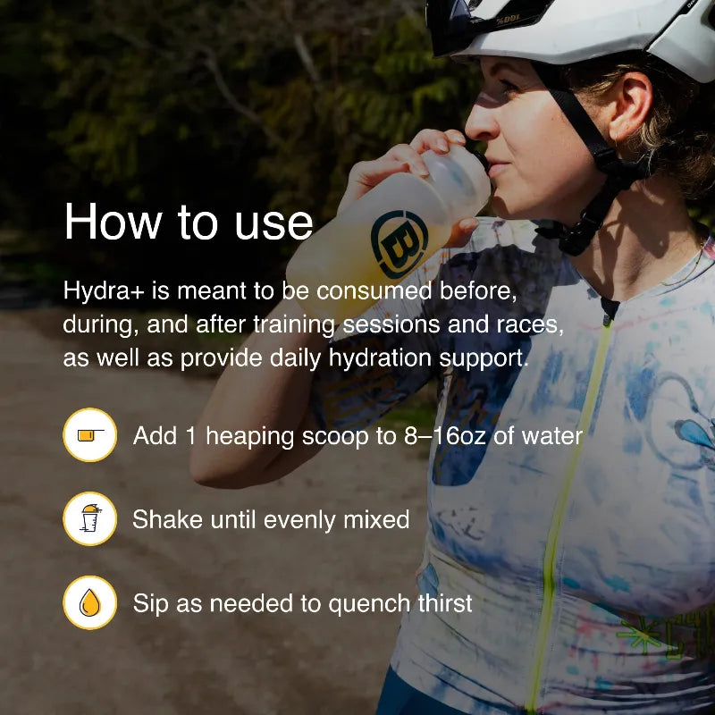 Instructional graphic showing a cyclist outdoors drinking from a Hydra+ shaker bottle. White text on the left explains how to use the product: add 1 heaping scoop to 8-16oz of water, shake until evenly mixed, and sip as needed to quench thirst.