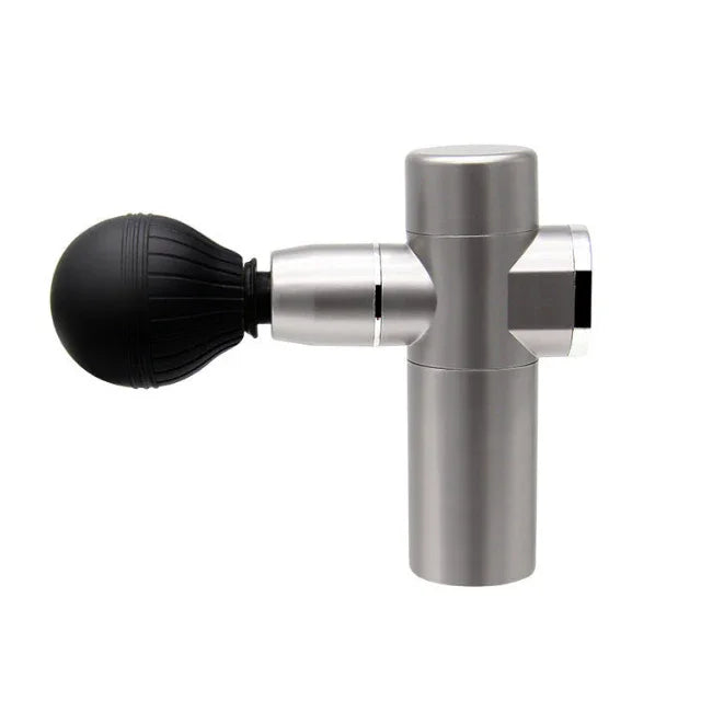 Silver handheld massage gun with black rubberized round attachment for fitness recovery
