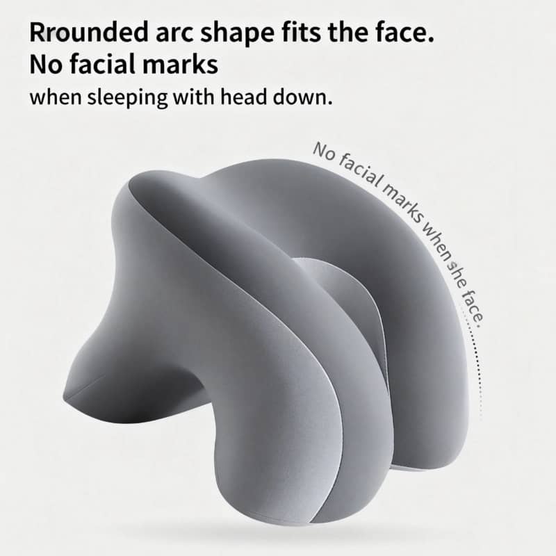 Gray neck pillow with rounded arc shape on a light gray background