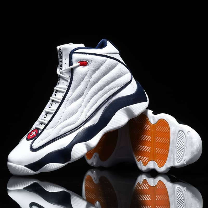 White high-top sneakers with blue and orange accents on a black background