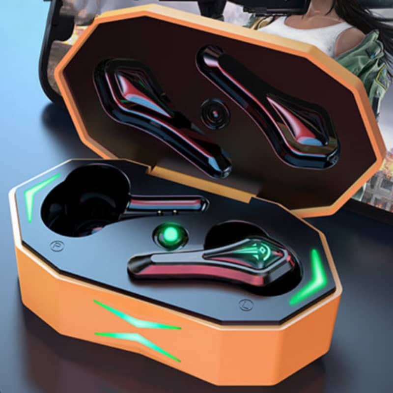 Black electronic devices with green accents in an open orange and black case.