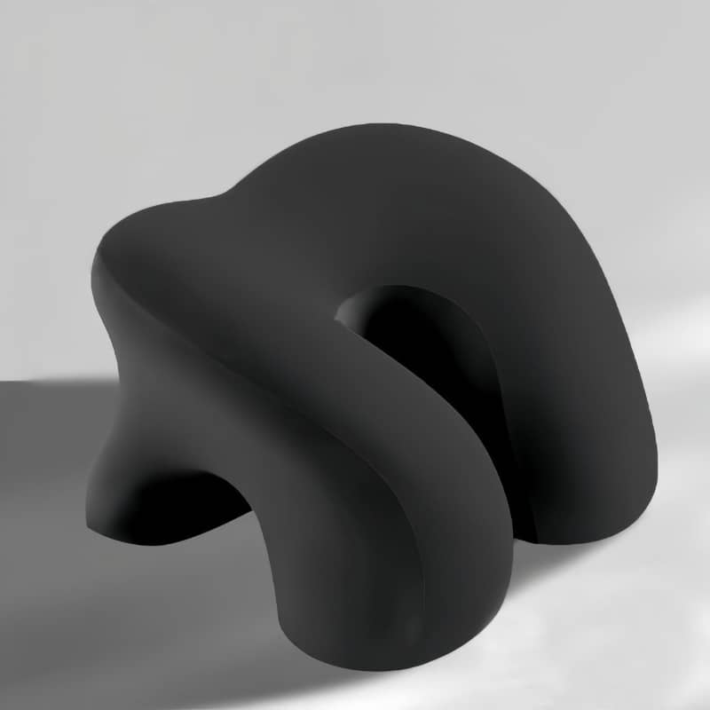 Black, abstract-shaped object on a gray background