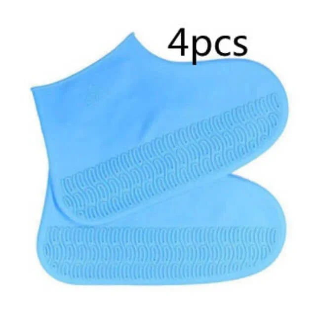 Two blue silicone shoe covers with text indicating '4 pcs' on a white background