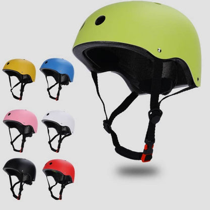 Set of colorful helmets on a light gray background