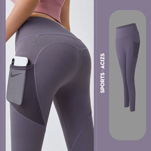 Gray leggings with a pocket on a light gray background