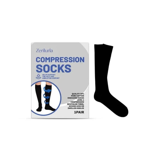 Black compression sock with packaging on a white background