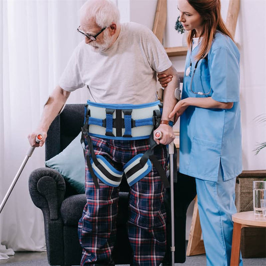 Caregiver assisting an elderly person using a walker in a home setting