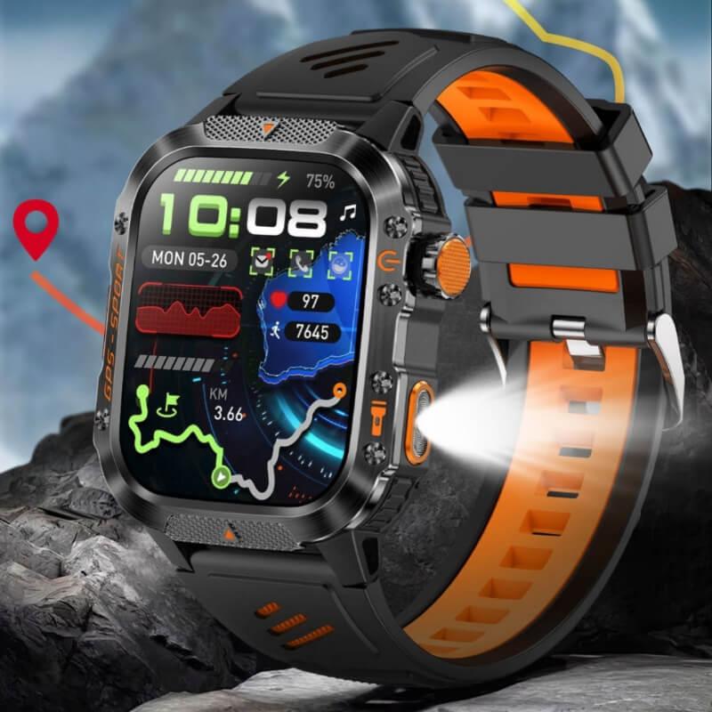 Rugged fitness smartwatch with GPS, heart rate display, and orange-black strap on rocky terrain