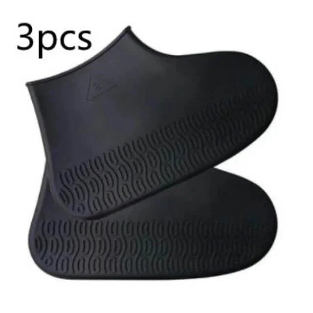 Three black rubber boots with a brand logo on a white background