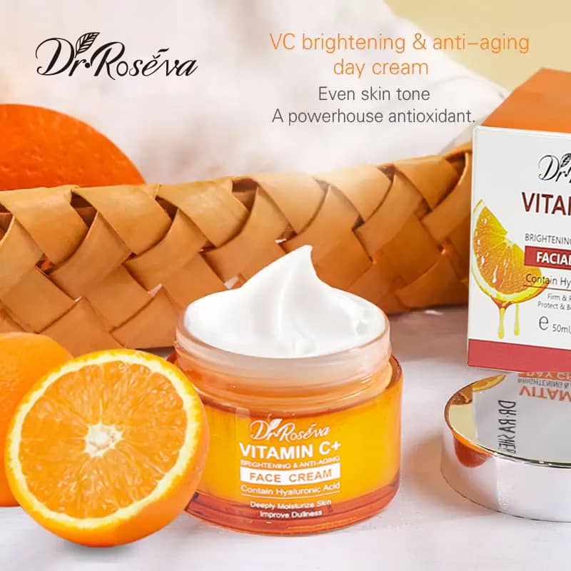 Dr Roseva Vitamin C+ face cream jar with oranges and packaging on a light background