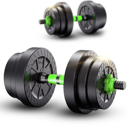 Pair of black dumbbells with green accents on a white background