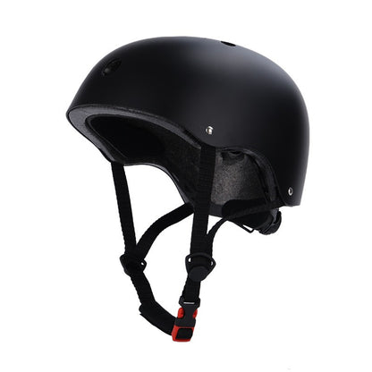 Black helmet with chin strap on a white background