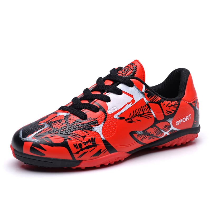 Red and black sports shoe on a white background