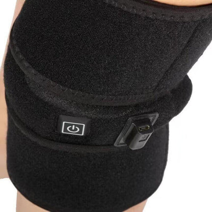 Black heated knee brace with power button and USB charging port for fitness recovery