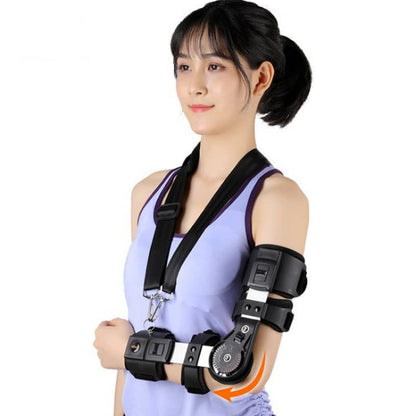 Woman wearing a black arm brace on a white background