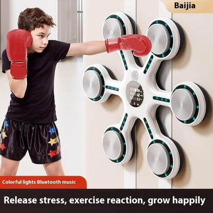 Boy training with wall-mounted boxing reflex trainer featuring lights and Bluetooth music