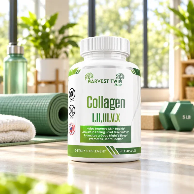 A white bottle of Harvest Twin Labs Collagen dietary supplement with green and black text, placed on a wooden table in a bright, modern home gym setting with a green yoga mat and dumbbell in the background.