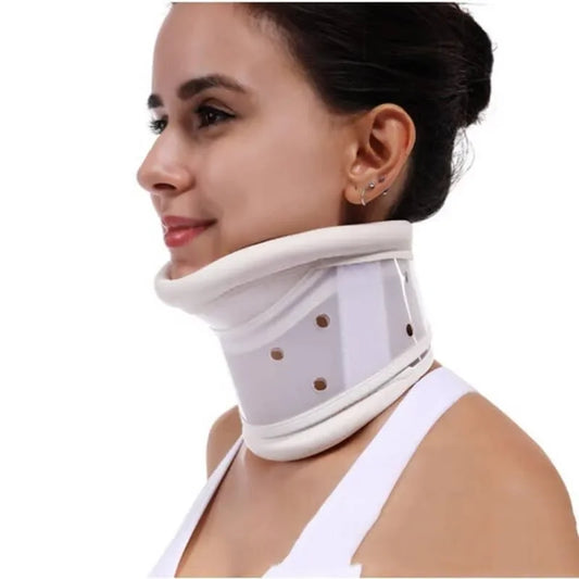 Woman wearing a white neck brace on a white background