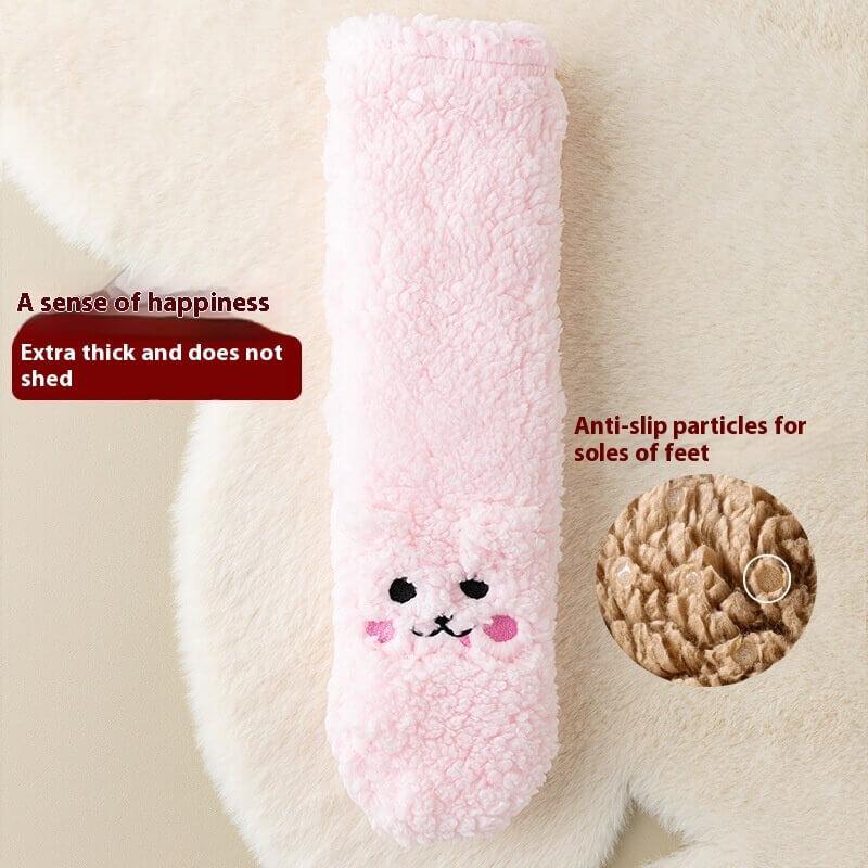 Fluffy pink slipper sock with cute animal face, anti-slip sole, and extra thick plush material