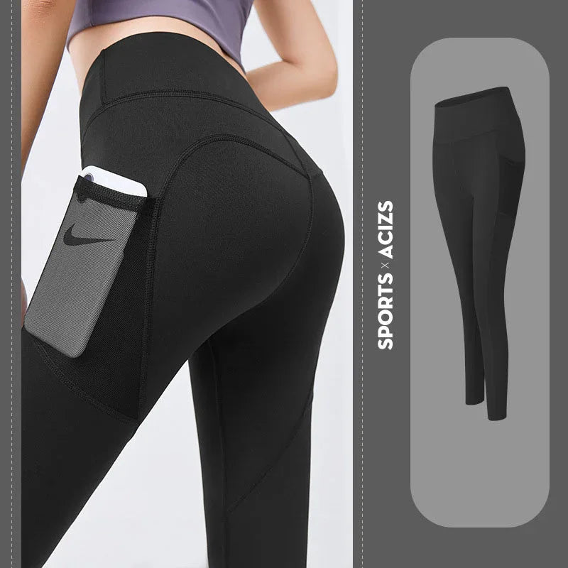 Black leggings with a pocket and Nike branding, on a plain background