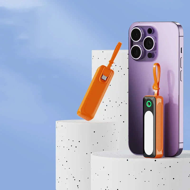 Orange magnetic fitness accessory attached to smartphone on minimalist display