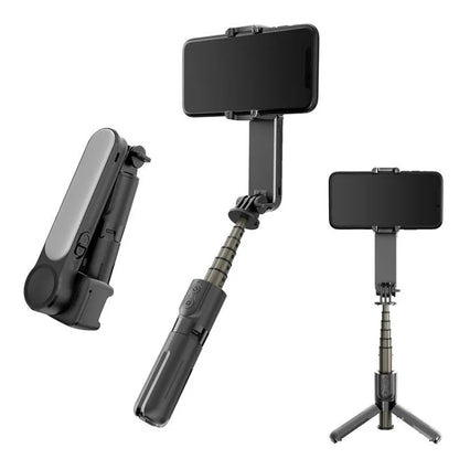Adjustable black selfie stick tripod with smartphone holder, shown folded and extended