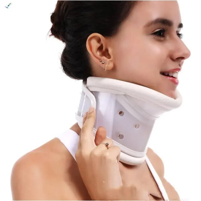 Woman wearing a white cervical collar on a white background