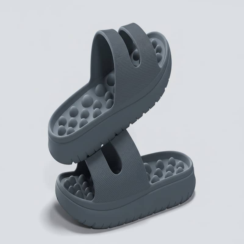 Gray sandal with textured sole on a light gray background