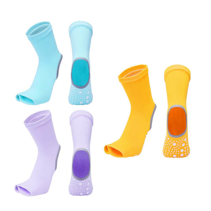 Colorful socks with textured grips on a white background
