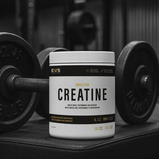 Container of EWS Creatine with gym equipment in the background