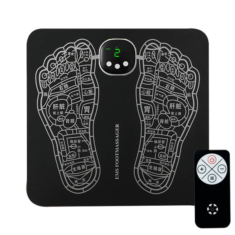Black foot massage mat with acupressure design and remote control on a white background