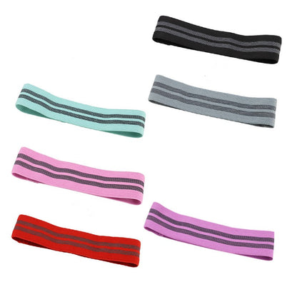 Set of colorful resistance bands with gray stripes on a white background