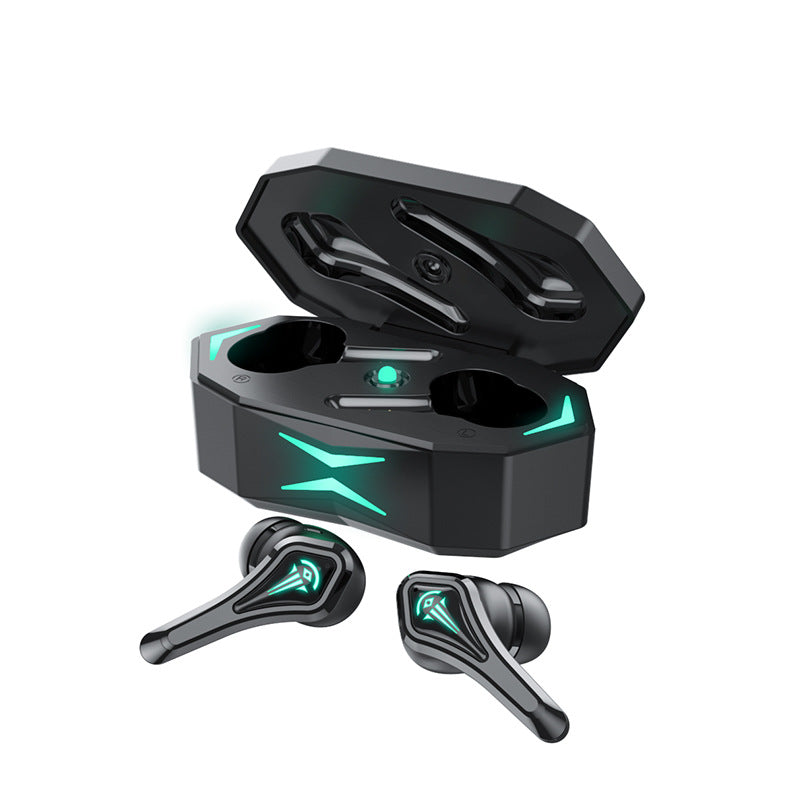 Black wireless earbuds with green accents and charging case on a white background