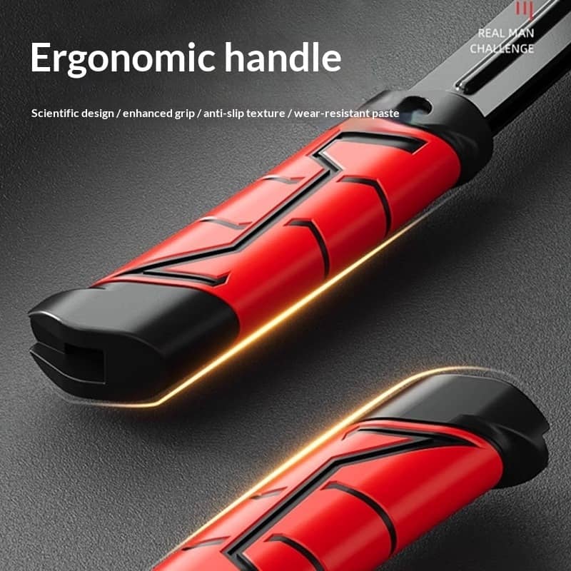 Red and black tool with ergonomic handle on a dark background