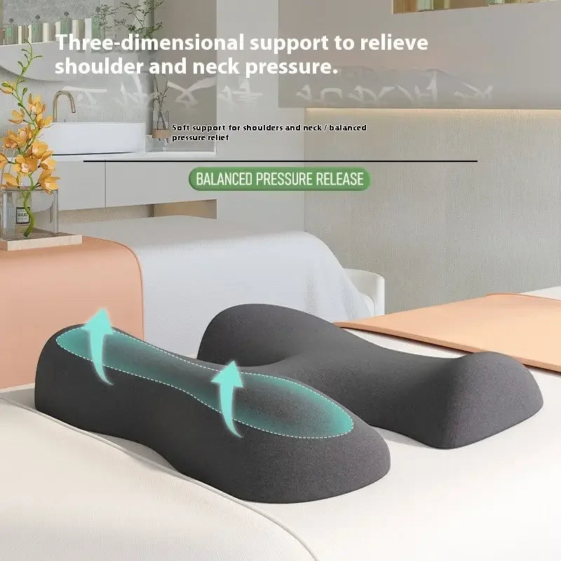 Ergonomic neck and shoulder support pillow with memory foam on a massage table