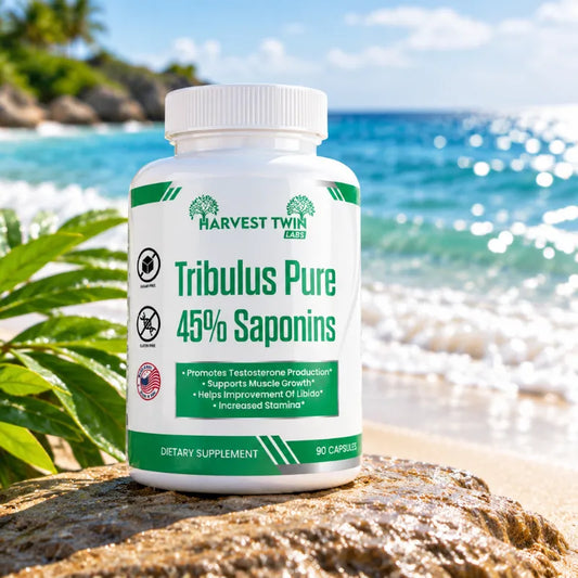 A white bottle of Harvest Twin Labs Tribulus Pure 45% Saponins dietary supplement, placed on a rock with a tropical beach background.